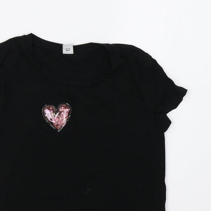 Close-up detail of TU girls’ black basic t-shirt, size 8, years