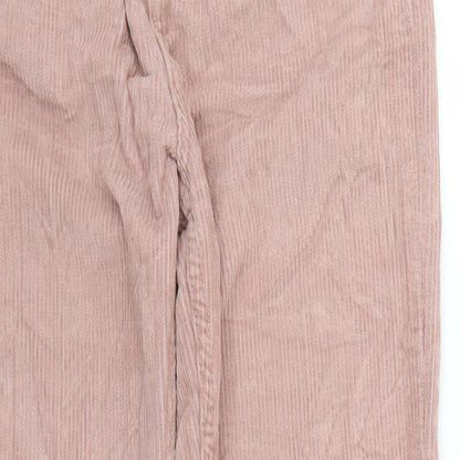 Close-up detail of BDG women’s pink mom jeans, size UK 29, 26-inch leg