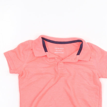 Close-up detail of Primark Baby Orange Basic Polo, size 18-24, Months
