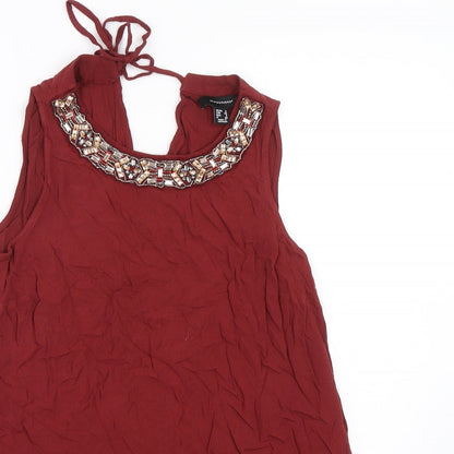 Close-up detail of Atmosphere women’s red basic tank, size UK 8