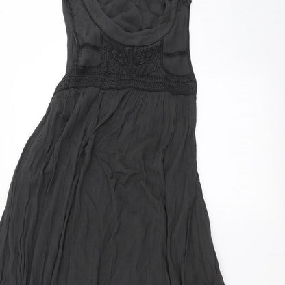 Close-up detail of ASOS women’s green a-line, size UK 8