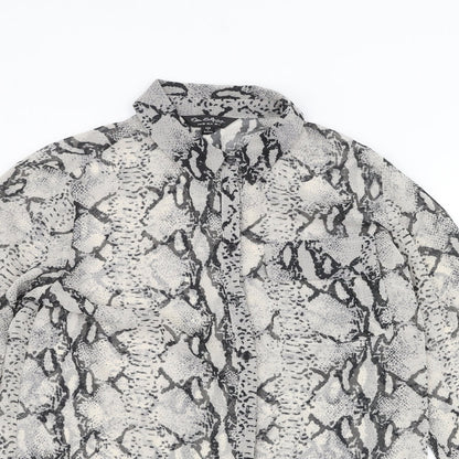 Close-up detail of Miss Selfridge women’s white animal print basic button-up, size UK 8
