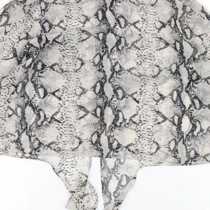 Brand and care label for Miss Selfridge women’s white animal print basic button-up, size UK 8