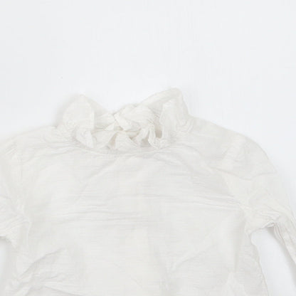 Close-up detail of Tu girls’ white basic button-up, size 6-9, months