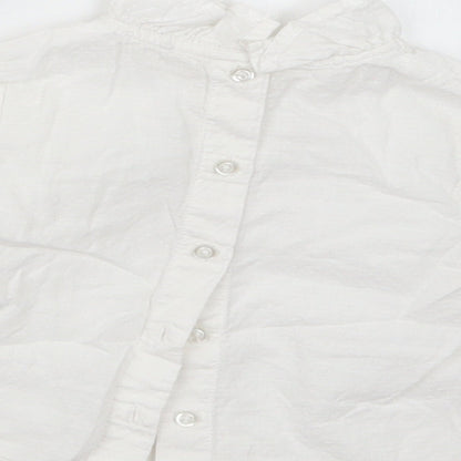 Brand and care label for Tu girls’ white basic button-up, size 6-9, months