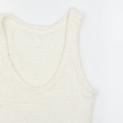 Close-up detail of George girls’ ivory basic tank, size 13, years