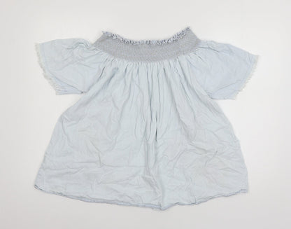 Back view of Denim & Co. women’s blue floral basic blouse, size UK 12
