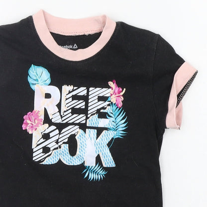 Close-up detail of Reebok girls’ black basic t-shirt, size S