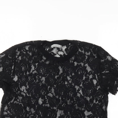 Close-up detail of Atmosphere women’s black floral basic blouse, size UK 12