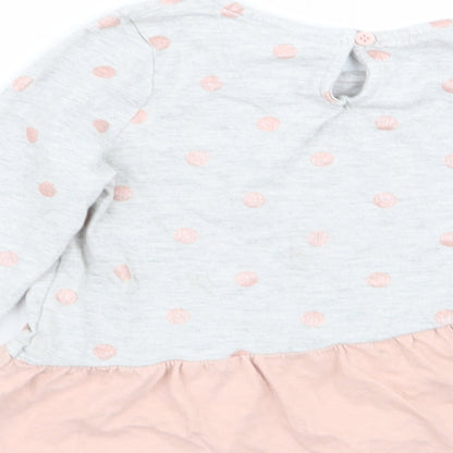 Brand and care label for Tu girls’ multicoloured polka dot basic t-shirt, size 2-3, years