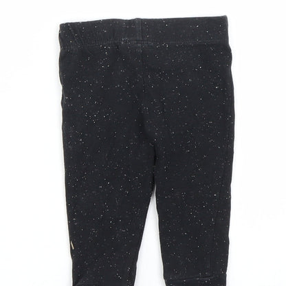Brand and care label for F&F girls’ black spotted capri leggings, size 3-6, months
