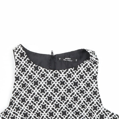 Close-up detail of Miss Selfridge women’s black argyle/diamond cropped tank, size UK 6