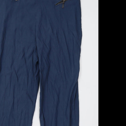 Close-up detail of canda women’s blue trousers, size UK 14, 28-inch leg