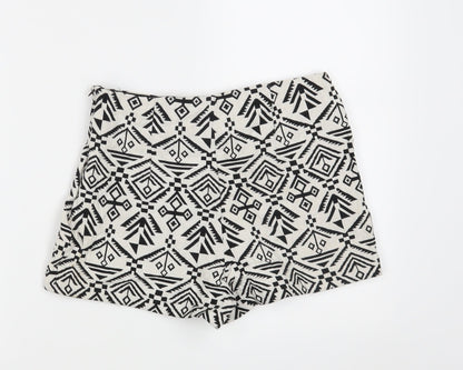 Back view of Miss Selfridge women’s white geometric hot pants shorts, size UK 10