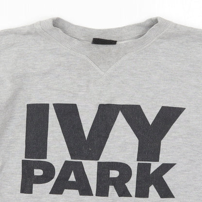 Close-up detail of IVY PARK women’s grey pullover sweatshirt, size XS