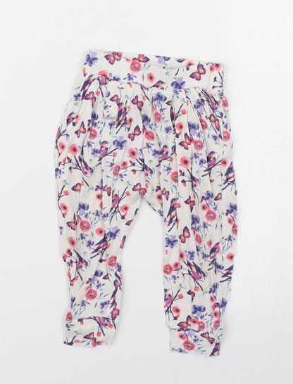 Additional front view of dymples girls’ white floral jogger trousers, size 12, months