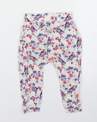 Back view of dymples girls’ white floral jogger trousers, size 12, months