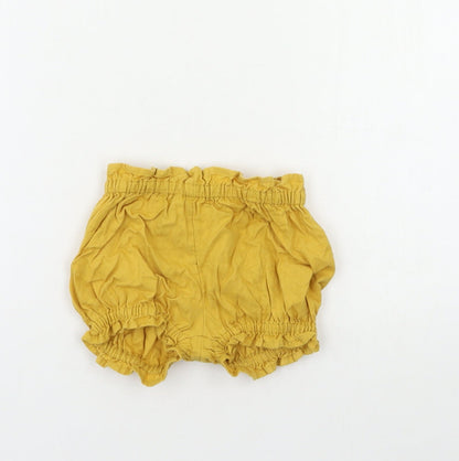 Front view of Tu Baby Yellow Cropped Trousers, size 6-9, Months