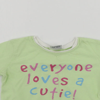 Close-up detail of Next girls’ green basic t-shirt, size 12-18, months