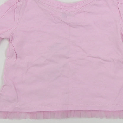 Brand and care label for Gap girls’ pink basic t-shirt, size 18-24, months