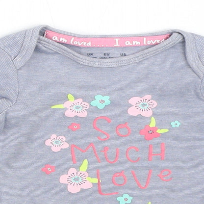 Close-up detail of F&F girls’ blue babygrow one-piece, size 0-3, months