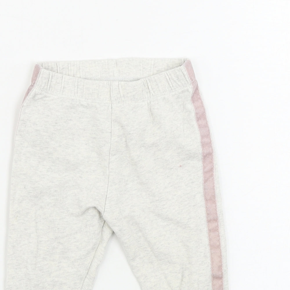Close-up detail of F&F girls’ beige sweatpants, size 9-12, months
