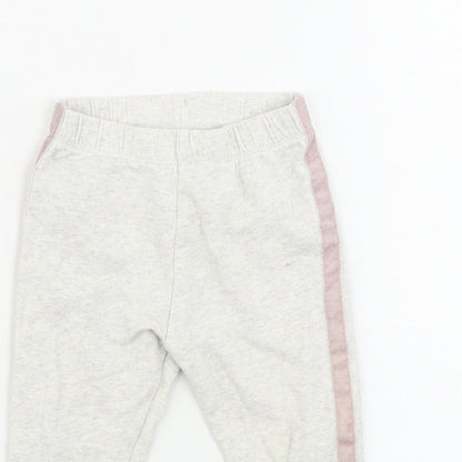 Close-up detail of F&F girls’ beige sweatpants, size 9-12, months