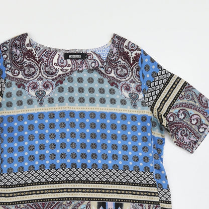 Close-up detail of Missguided women’s blue paisley basic blouse, size UK 8