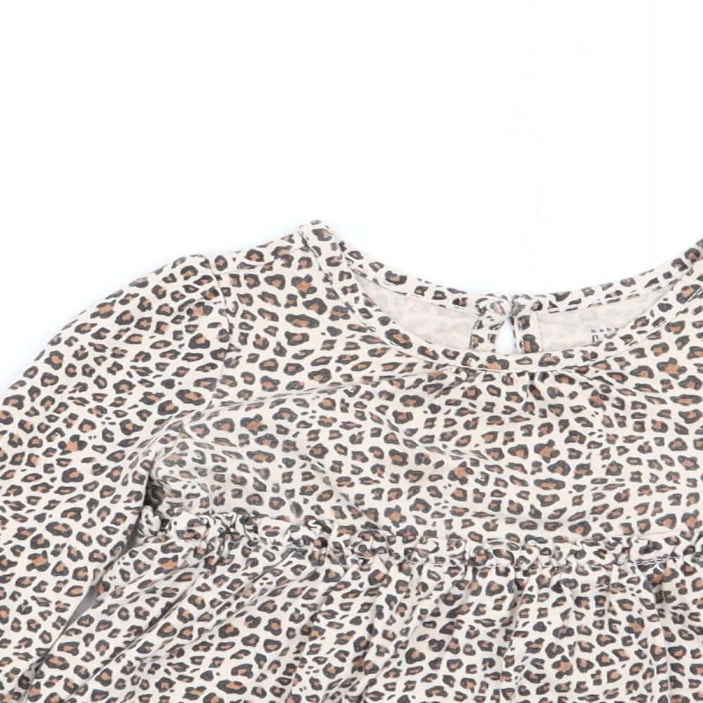 Close-up detail of Gap girls’ multicoloured animal print fit & flare, size 6-9, months