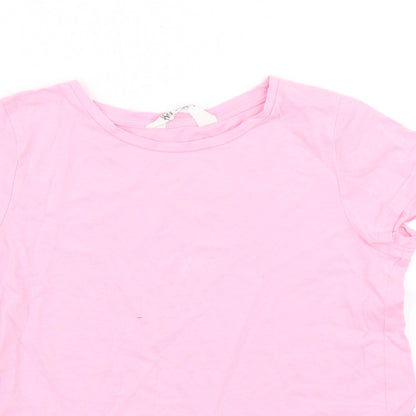Close-up detail of H&M girls’ pink basic t-shirt, size 9-10, years - peplum