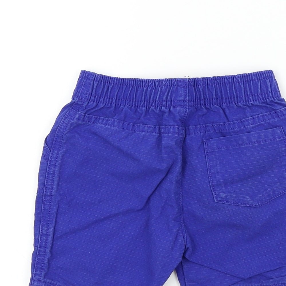 Brand and care label for Tu boys’ blue colourblock cropped trousers, size 12-18, months