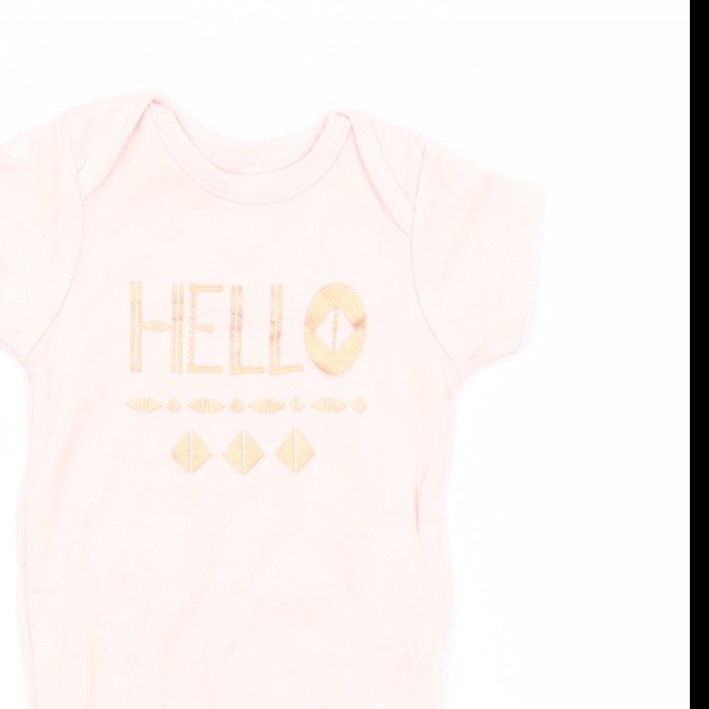 Close-up detail of chick pea girls’ pink babygrow one-piece, size 3-6, months