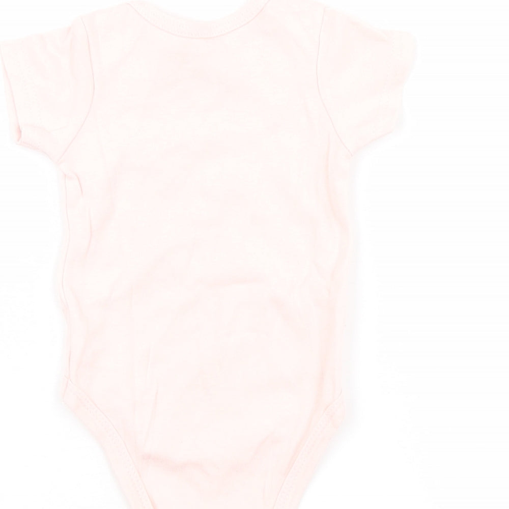 Brand and care label for chick pea girls’ pink babygrow one-piece, size 3-6, months