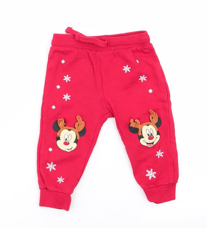 Front view of Disney boys’ red jogger trousers, size 12, months