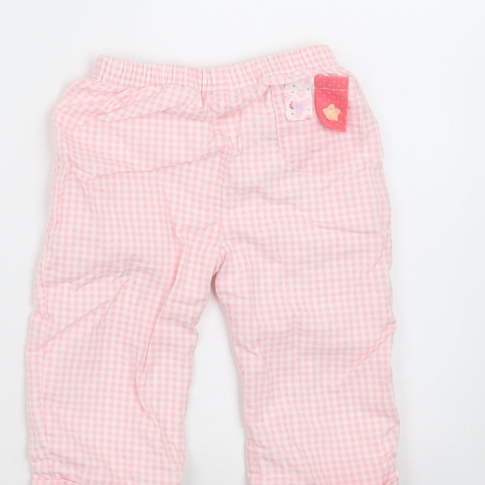 Brand and care label for baby bruin girls’ pink check trousers, size 6-9, months