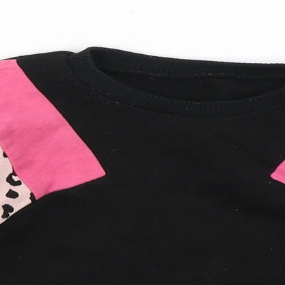 Close-up detail of Matalan girls’ black colourblock basic t-shirt, size 9-12, months