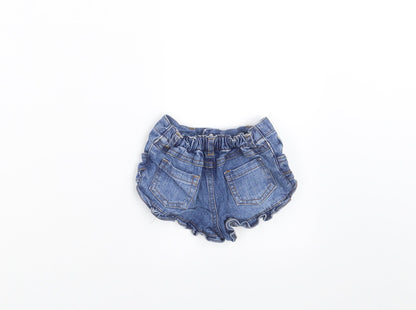 Back view of Early Days girls’ blue denim trousers, size 6-9, months - hotpants