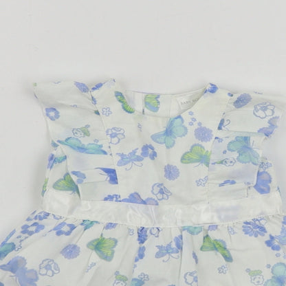 Close-up detail of Baby Boutique girls’ white floral a-line, size 0-3, months