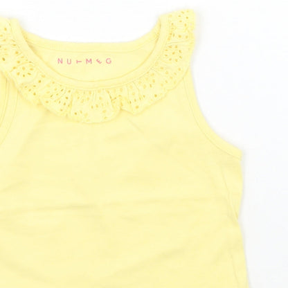 Close-up detail of Nutmeg girls’ yellow basic tank, size 12-18, months