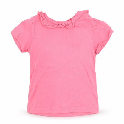 Front view of Nutmeg girls’ pink basic t-shirt, size 12, months