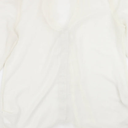 Brand and care label for Miss Selfridge women’s white basic blouse, size UK 12