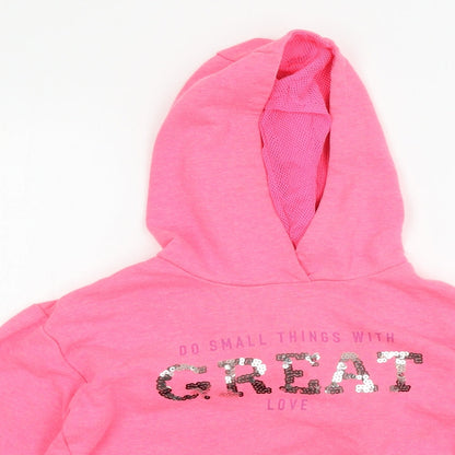 Close-up detail of Dunnes girls’ pink jersey pullover hoodie, size 10-11, years - great love