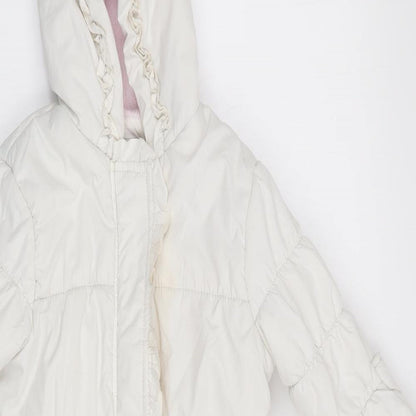 Close-up detail of onme girls’ white basic coat coat, size 6-9, months - all in one coat