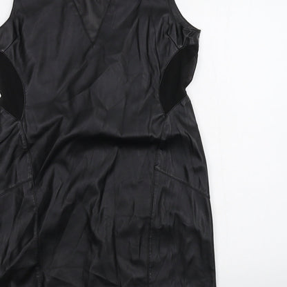 Brand and care label for Miss Selfridge women’s black a-line, size UK 16
