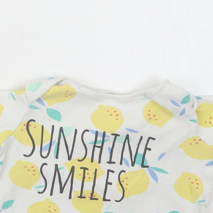 Close-up detail of F&F girls’ yellow geometric basic t-shirt, size 2-3, years