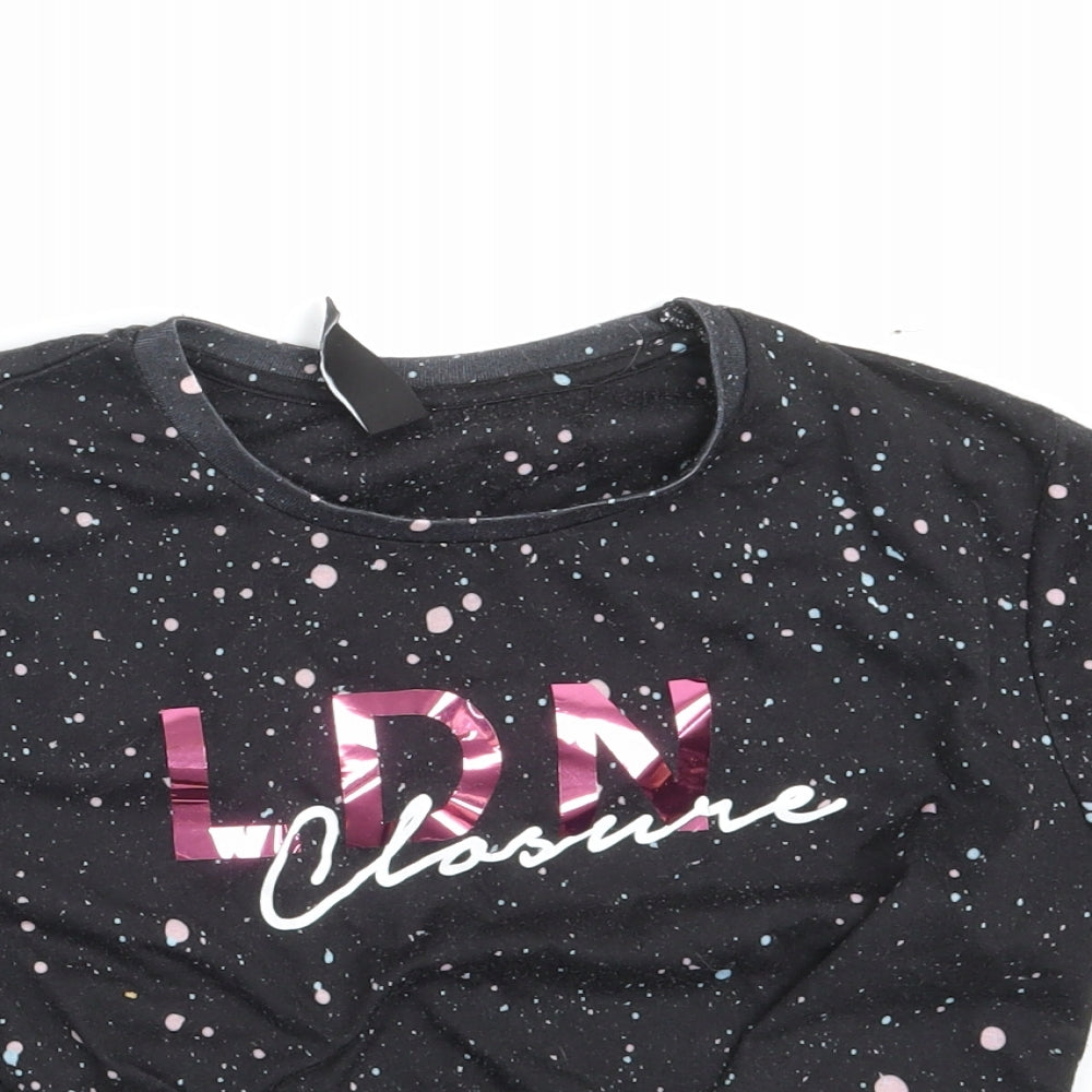Close-up detail of Closure girls’ black spotted basic t-shirt, size 12-13, years
