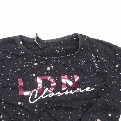 Close-up detail of Closure girls’ black spotted basic t-shirt, size 12-13, years