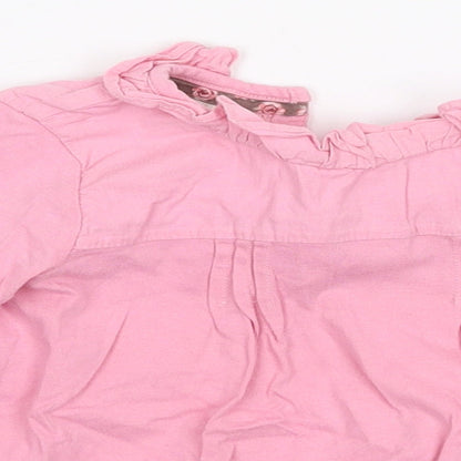 Close-up detail of Monsoon girls’ pink basic t-shirt, size 6-9, months