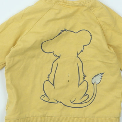 Brand and care label for George girls’ yellow animal print jumper, size 6-9, months