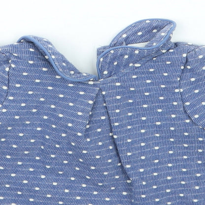 Close-up detail of Next girls’ blue polka dot basic t-shirt, size 3-6, months